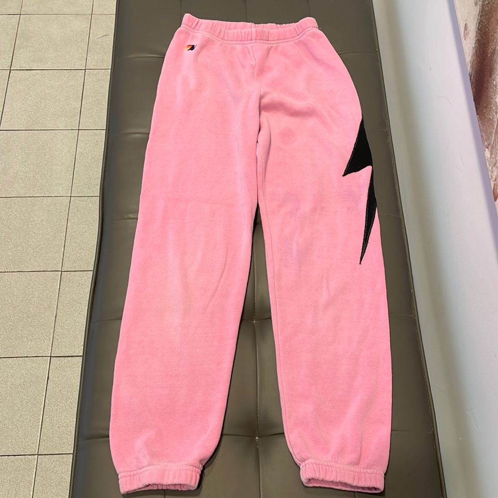 Girls Aviator Nation signature lightning bolt down the leg sweatpants.